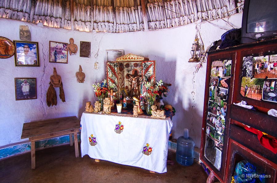 An alter with Catholic and Mayan figures
